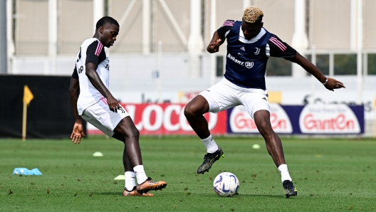 TURIN, ITALY - AUGUST 30: Timothy Weah, Paul Pogba of Juventus during a training session at JTC on August 30, 2023 in Turin, Italy. (Photo by Daniele Badolato - Juventus FC/Juventus FC via Getty Images)