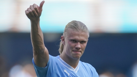 Manchester City's Erling Haaland celebrates at the end of the English Premier League soccer match between Manchester City and Fulham at the Etihad stadium in Manchester, England, Saturday, Sept. 2, 2023. (AP Photo/Dave Thompson)