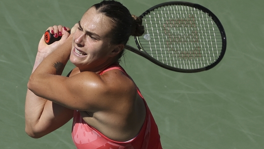 Aryna Sabalenka, of Belarus, returns a shot to Clara Burel, of France, during the third round of the U.S. Open tennis championships, Saturday, Sept. 2, 2023, in New York. (AP Photo/Andres Kudacki)