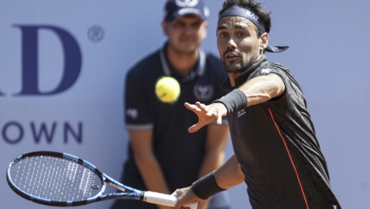 Italy's Fabio Fognini returns the ball to Spain's Albert Ramos-Vinolas at the Swiss Open tennis tournament in Gstaad, Switzerland, on Tuesday, July 18, 2023. (Peter Schneider/Keystone via AP)