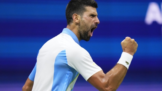 Novak Djokovic, of Serbia, reacts during a match against Ben Shelton, of the United States, during the men's singles semifinals of the U.S. Open tennis championships, Friday, Sept. 8, 2023, in New York. (AP Photo/Frank Franklin II)