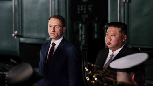 This handout photograph taken and released by Ministry of Natural Resources and Environment of Russia on September 12, 2023, shows North Korea's leader Kim Jong Un (R) welcomed by Russia's Minister of Natural Resources and Environment Alexander Kozlov (L) upon his arrival at Khasan train station, Primorky region, at the start of his official visit to Russia. North Korean leader Kim Jong Un arrived in Russia on September 12, 2023 ahead of a meeting with President Vladimir Putin that the United States has warned could see an arms deal to support Moscow's assault on Ukraine. (Photo by Handout / RUSSIAN ENVIRONMENT MINISTRY / AFP) / RESTRICTED TO EDITORIAL USE - MANDATORY CREDIT "AFP PHOTO / RUSSIAN ENVIRONMENT MINISTRY" - NO MARKETING NO ADVERTISING CAMPAIGNS - DISTRIBUTED AS A SERVICE TO CLIENTS