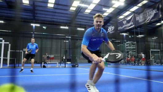 DERBY, ENGLAND - SEPTEMBER 30: Marek Marksoo of Estonia in action in the mens doubles match against Mateusz Mironski and Jake Slowinski of Poland during day one of the XVI World Padel Championships European Qualifying at We Are Padel Derby on September 30, 2022 in Derby, England. (Photo by Morgan Harlow/Getty Images for LTA)