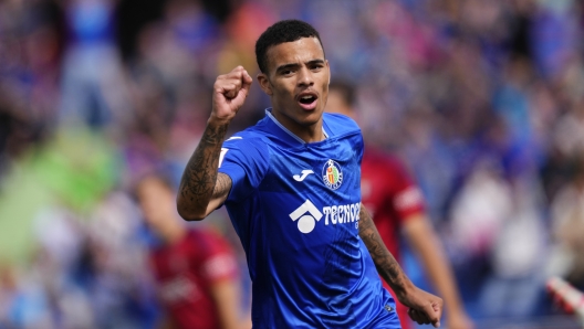 Getafe's Mason Greenwood reacts after coming on late as substitute to make his debut during a Spanish La Liga soccer match between Getafe and Osasuna at the Coliseum stadium in Getafe, Spain, Sunday, Sept. 17, 2023. (AP Photo/Jose Breton)