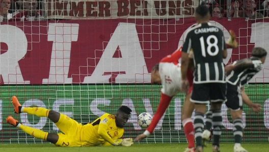 Bayern's Leroy Sane, third right, scores his side's opening goal during the Champions League group A soccer match between Bayern Munich and Manchester United at the Allianz Arena stadium in Munich, Germany, Wednesday, Sept. 20, 2023. (AP Photo/Matthias Schrader)