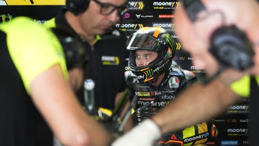 Mooney VR46 Racing Team (Ducati) team member Luca Marini take a quick break at Pit lane during MotoGP practice session at the Buddh International Circuit in Greater Noida, on the outskirts of New Delhi, India Friday, Sept. 22, 2023. (AP Photo/Manish Swarup)