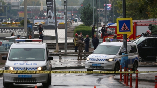 Members of Turkish Police Special Forces secure the area near the Interior Ministry following a bomb attack in Ankara, on October 1, 2023, leaving two police officers injured. The interior ministry said on October 1, 2023, that two attackers arrived in a commercial vehicle around 9:30 am (0630 GMT) "in front of the entrance gate of the General Directorate of Security of our Ministry of the Interior, and carried out a bomb attack." (Photo by Adem ALTAN / AFP)