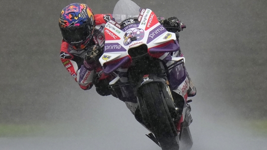 Spain's Jorge Martin steers his motorcycle in the rain, on his way to winning the MotoGP race of Japanese Motorcycle Grand Prix at the Twin Ring Motegi circuit in Motegi, north of Tokyo Sunday, Oct. 1, 2023.(AP Photo/Shuji Kajiyama)