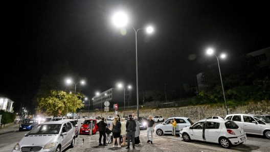 People on the street in the area of ??via Pisciarelli, the epicenter of the earthquake, on the border between the municipality of Pozzuoli and Agnano, a hamlet of Naples, Italy, 03 October 2023. A 4.0-magnitude earthquake late on Monday at the Campi Flegrei (Phlegraean Fields) has heightened concern among people living in the volcanic area near Naples about a recent wave of seismic activity.ANSA/CIRO FUSCO