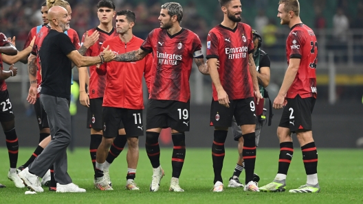 MILAN, ITALY - SEPTEMBER 30: head coach of AC Milan Stefano Pioli and Theo Hernandez after the Serie A TIM match between AC Milan and SS Lazio at Stadio Giuseppe Meazza on September 30, 2023 in Milan, Italy. (Photo by Claudio Villa/AC Milan via Getty Images)