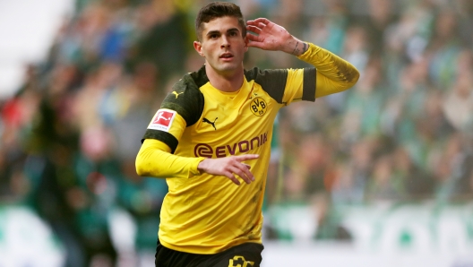 BREMEN, GERMANY - MAY 04: Christian Pulisic of Borussia Dortmund celebrates scoring the opening goal during the Bundesliga match between SV Werder Bremen and Borussia Dortmund at Weserstadion on May 04, 2019 in Bremen, Germany. (Photo by Martin Rose/Bongarts/Getty Images)