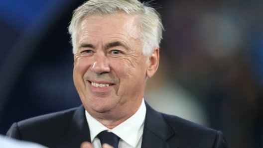 Real Madrid's Italian coach Carlo Ancelotti smiles before the UEFA Champions League 1st round day 2 Group C football match Napoli vs Real Madrid at the Diego Armando Maradona stadium in Naples on October 3, 2023. (Photo by Carlo HERMANN / AFP)