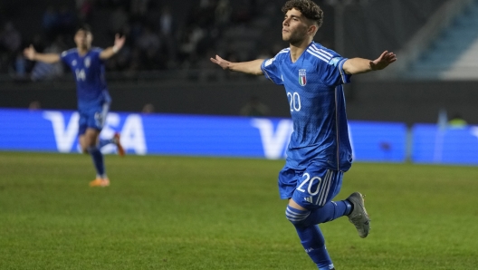 Italy's Simone Pafundi celebrates scoring his side's second goal against South Korea during a FIFA U-20 World Cup semifinal soccer match at Diego Maradona stadium in La Plata, Argentina, Thursday, June 8, 2023. (AP Photo/Natacha Pisarenko)