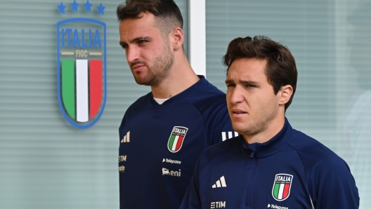 FLORENCE, ITALY - OCTOBER 13: Federico Chiesa and Federico Gatti of Italy look on during a training center at Centro Tecnico Federale di Coverciano on October 13, 2023 in Florence, Italy. (Photo by Claudio Villa/Getty Images)