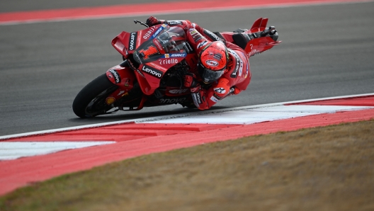 TOPSHOT - Ducati Lenovo Teams Italian rider Francesco Bagnaia competes in the Indonesian Grand Prix MotoGP at the Mandalika International Circuit in Kuta Mandalika, Central Lombok on October 15, 2023. (Photo by SONNY TUMBELAKA / AFP)