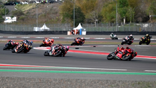 Riders compete in the Indonesian Grand Prix MotoGP at the Mandalika International Circuit in Kuta Mandalika, Central Lombok on October 15, 2023. (Photo by SONNY TUMBELAKA / AFP)