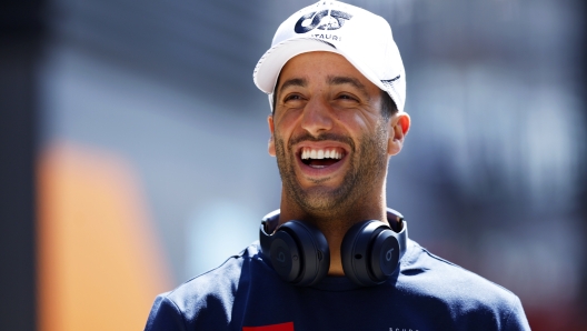 BUDAPEST, HUNGARY - JULY 23: Daniel Ricciardo of Australia and Scuderia AlphaTauri walks in the Paddock prior to the F1 Grand Prix of Hungary at Hungaroring on July 23, 2023 in Budapest, Hungary. (Photo by Francois Nel/Getty Images)