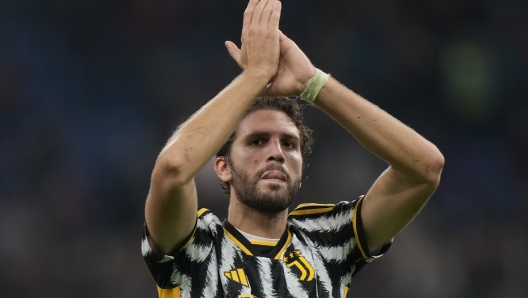 Juventus' Manuel Locatelli celebrates after a Serie A soccer match between AC Milan and Juventus, at the San Siro stadium in Milan, Italy, Sunday, Oct. 22, 2023. Juventus won 1-0. (AP Photo/Luca Bruno)