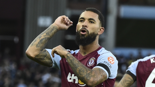 Aston Villa's Douglas Luiz celebrates after scoring his side's 2nd goal from the penalty spot during the English Premier League soccer match between Aston Villa and West Ham United at Villa Park in Birmingham, England, Sunday, Oct. 22, 2023. (AP Photo/Rui Vieira)