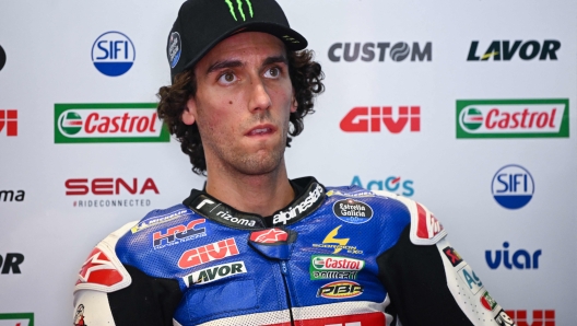 Honda Spanish rider Alex Rins looks on prior to the qualifying rounds ahead of the Italian MotoGP race at Mugello Circuit in Mugello, on June 10, 2023. (Photo by Filippo MONTEFORTE / AFP)