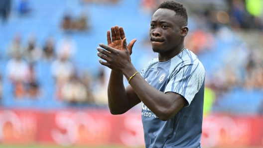 Montpellier's Nigerian forward #08 Akor Adams greets supporters prior to the French L1 football match between Montpellier Herault SC and Reims FC at Stade de la Mosson in Montpellier, southern France on August 27, 2023. (Photo by Sylvain THOMAS / AFP)