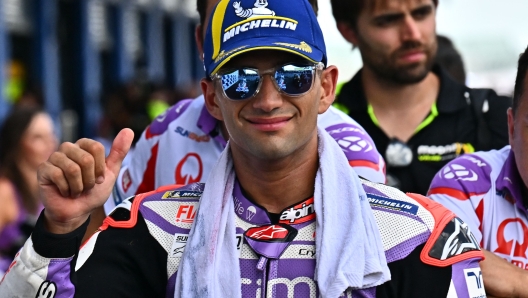 Prima Pramac's Spanish rider Jorge Martin reacts after securing the pole position in the qualifying session of the MotoGP Thailand Grand Prix at the Buriram International Circuit in Buriram on October 28, 2023. (Photo by Lillian SUWANRUMPHA / AFP)