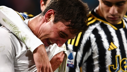 Juventus Italian defender Andrea Cambiaso (C) celebrates with teammates after scoring a first goal for his team during the Italian Serie A football match Juventus vs Hellas Verona at the Allianz Stadium in Turin on October 28, 2023. (Photo by MARCO BERTORELLO / AFP)