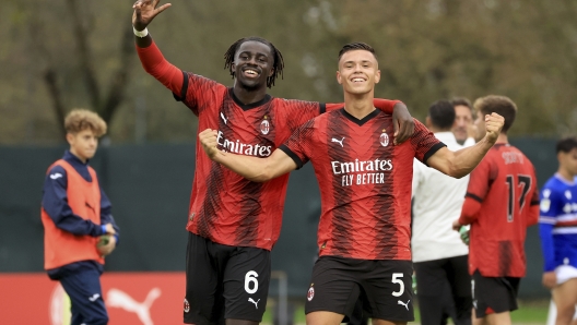 MILAN, ITALY - OCTOBER 29: Clinton Nsiala Makengo (L) of AC Milan and Jan-Carlo Simic (R) celebrates the win at end of the Primavera 1 match between AC Milan U19 and Sampdoria U19 at Vismara PUMA House of Football on October 29, 2023 in Milan, Italy. (Photo by Giuseppe Cottini/AC Milan via Getty Images)