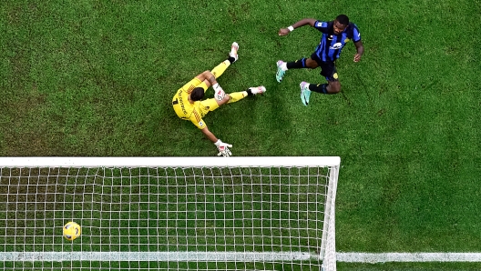 MILAN, ITALY - OCTOBER 29: (EDITORS NOTE: In this photo taken from a remote camera from above the pitch) Marcus Thuram of FC Internazionale scores his team's a first goal during the Serie A TIM match between FC Internazionale and AS Roma at Stadio Giuseppe Meazza on October 29, 2023 in Milan, Italy. (Photo by Mattia Ozbot - Inter/Inter via Getty Images)