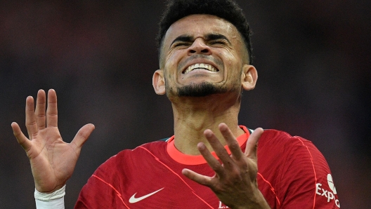 (FILES) Liverpool's Colombian midfielder Luis Diaz reacts during the UEFA Champions League semi-final first leg football match between Liverpool and Villarreal, at the Anfield Stadium, in Liverpool, on April 27, 2022. The mother of Colombian footballer Luis Diaz, who plays for Liverpool of England, was rescued on October 28, 2023, after the authorities reported the kidnapping of his parents in the department of Guajira (north), said President Gustavo Petro. (Photo by Oli SCARFF / AFP)