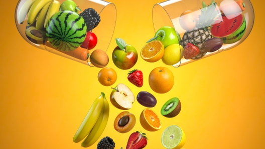 Different fruits in medical capsule, Vitamin dietary supplement and health nutrition concept. 3d illustration