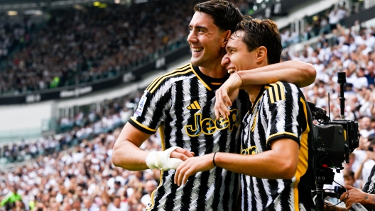 TURIN, ITALY - SEPTEMBER 16: Federico Chiesa of Juventus celebrates after scoring his team's second goal with teammate Dusan Vlahovic during the Serie A TIM match between Juventus and SS Lazio at Allianz Stadium on September 16, 2023 in Turin, Italy. (Photo by Daniele Badolato - Juventus FC/Juventus FC via Getty Images)