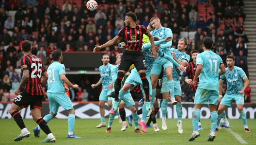 BOURNEMOUTH, ENGLAND - OCTOBER 21: Lloyd Kelly of AFC Bournemouth contends for the aerial ball with Sasa Kalajdzic of Wolverhampton Wanderers during the Premier League match between AFC Bournemouth and Wolverhampton Wanderers at Vitality Stadium on October 21, 2023 in Bournemouth, England. (Photo by Steve Bardens/Getty Images)