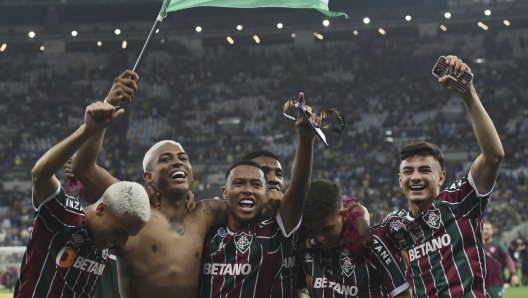 Players of Brazil's Fluminense celebrate after beating Argentina's Boca Juniors in the final soccer match of the Copa Libertadores at Maracana stadium in Rio de Janeiro, Brazil, Saturday, Nov. 4, 2023. (AP Photo/Alexandre Brum)