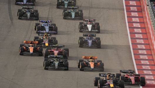 Red Bull driver Max Verstappen, front, of the Netherlands, leads the field at the start of the sprint ahead of the Formula One U.S. Grand Prix auto race at Circuit of the Americas, Saturday, Oct. 21, 2023, in Austin, Texas. (AP Photo/Eric Gay)