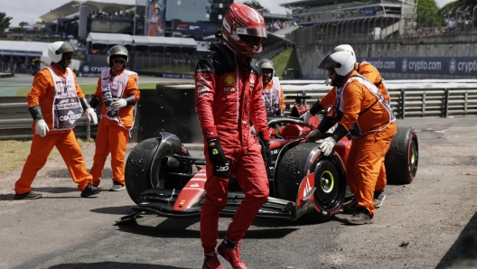 epa10959685 Scuderia Ferrari's Monegasque driver Charles Leclerc reacts after crashing in the warm-up lap ahead of the Formula 1 Grand Prix of Sao Paulo, at the Interlagos circuit in Sao Paulo, Brazil, 05 November 2023.  EPA/Isaac Fontana