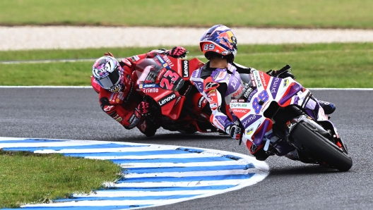 Prima Pramac's Spanish rider Jorge Martin (L) leads Ducati Lenovo Team's Italian rider Enea Bastianini during the first qualifying session of the MotoGP Australian Grand Prix at Phillip Island on October 21, 2023. (Photo by Paul CROCK / AFP) / -- IMAGE RESTRICTED TO EDITORIAL USE - STRICTLY NO COMMERCIAL USE --