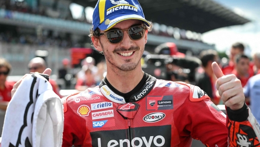 Third-placed Ducati Lenovo Team's Italian rider Francesco Bagnaia reacts after the MotoGP Malaysian Grand Prix at the Sepang International Circuit in Sepang on November 12, 2023. (Photo by MOHD RASFAN / AFP)