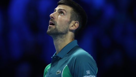 TURIN, ITALY - NOVEMBER 14: Novak Djokovic of Serbia reacts against Jannik Sinner of Italy during the Men's Singles Round Robin match on day three of the Nitto ATP Finals at Pala Alpitour on November 14, 2023 in Turin, Italy. (Photo by Clive Brunskill/Getty Images)