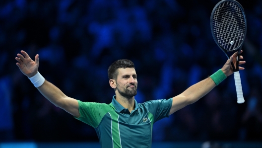 Novak Djokovic of Serbia celebrates after winning the final against Jannik Sinner of Italy at the Nitto ATP Finals tennis tournament in Turin, Italy, 19 November 2023.  ANSA/ALESSANDRO DI MARCO