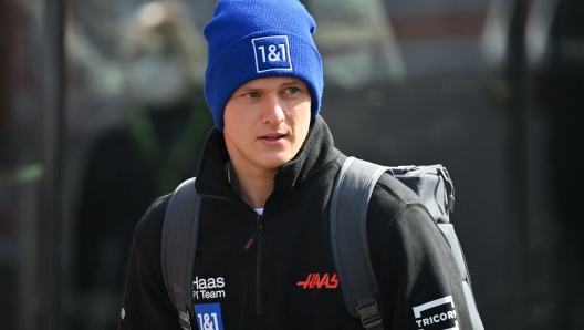 Haas F1 Team Germany's Mick Schumacher arrives ahead the second practice session at the Autodromo Internazionale Enzo e Dino Ferrari race track in Imola, Italy, on April 23, 2022,  ahead of the Formula One Emilia Romagna Grand Prix. (Photo by ANDREJ ISAKOVIC / AFP)