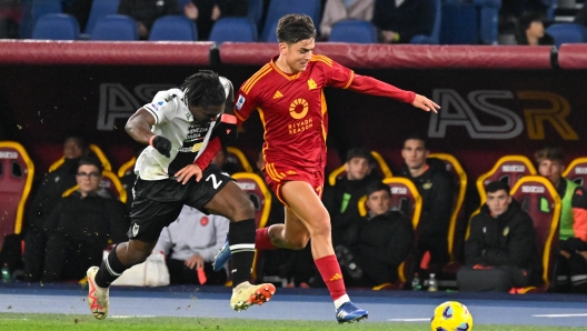 ROME, ITALY - NOVEMBER 26: Paulo Dybala of AS Roma competes for the ball during the Serie A TIM match between AS Roma and Udinese Calcio at Stadio Olimpico on November 26, 2023 in Rome, Italy. (Photo by Fabio Rossi/AS Roma via Getty Images)