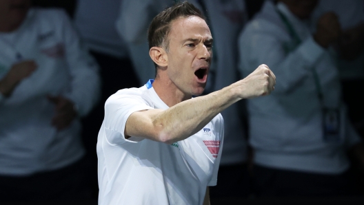 MALAGA, SPAIN - NOVEMBER 23: Filippo Volandri of Italy celebrates a point during the Quarter-Final match against Botic van de Zandschulp of the Netherlands in the Davis Cup Final at Palacio de Deportes Jose Maria Martin Carpena on November 23, 2023 in Malaga, Spain. (Photo by Clive Brunskill/Getty Images for ITF)