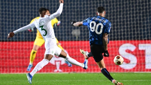 Atalanta's Italian forward #90 Gianluca Scamacca kicks and scores the team's first goal during the UEFA Europa League group D football match between Atalanta and Sporting Lisbon at the Gewiss Stadium in Bergamo on November 30, 2023. (Photo by Marco BERTORELLO / AFP)