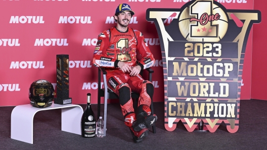 VALENCIA, SPAIN - NOVEMBER 26: Francesco Bagnaia of Italy and Ducati Lenovo Team speaks during the press conference during the MotoGP race during the MotoGP of Valencia - Race at Ricardo Tormo Circuit on November 26, 2023 in Valencia, Spain. (Photo by Mirco Lazzari gp/Getty Images)