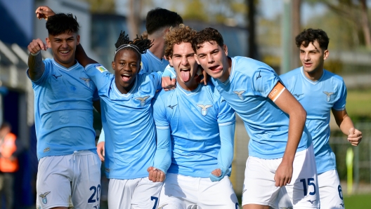 ROME, ITALY - DECEMBER 02: Diego Gonzalez of SS Lazio celebrates a opening goal with his team mates  during the Primavera 1 match between SS Lazio and AC Milan at the Formello sport centre on December 02, 2023 in Rome, Italy. (Photo by Marco Rosi - SS Lazio/Getty Images)