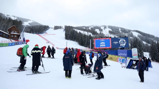 BEAVER CREEK, COLORADO - DECEMBER 02: Members of different ski teams wait to hear the jury's decision regarding the Audi FIS Alpine Ski World Cup Men's Downhill at Beaver Creek Resort on December 02, 2023 in Beaver Creek, Colorado. The decision was made to cancel today's downhill race.   Ezra Shaw/Getty Images/AFP (Photo by EZRA SHAW / GETTY IMAGES NORTH AMERICA / Getty Images via AFP)