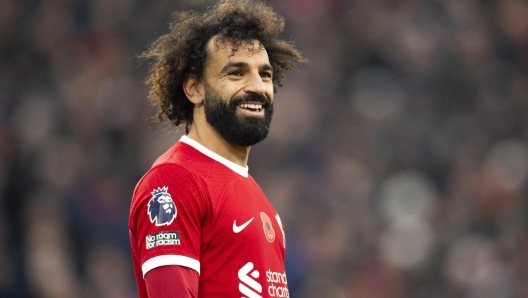 epa10971934 Mohamed Salah of Liverpool looks on during the English Premier League soccer match between Liverpool FC and Brentford FC, in Liverpool, Britain, 12 November 2023.  EPA/PETER POWELL No use with unauthorized audio, video, data, fixture lists, club/league logos, 'live' services' or as NFTs. Online in-match use limited to 120 images, no video emulation. No use in betting, games or single club/league/player publications.