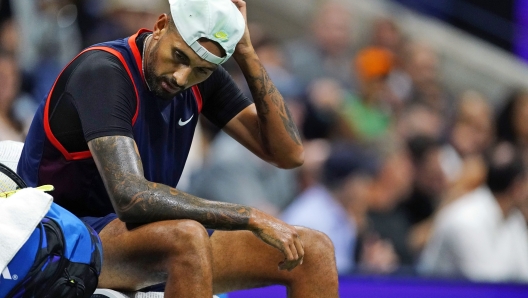 Nick Kyrgios, of Australia, takes a break as he play Karen Khachanov, of Russia, during the quarterfinals of the U.S. Open tennis championships, Tuesday, Sept. 6, 2022, in New York. Kyrgios pulled out of the U.S. Open on Thursday, Aug. 10, 2023, meaning he will have missed all four Grand Slam tournaments the year after reaching his first major final. (AP Photo/Frank Franklin II, File)