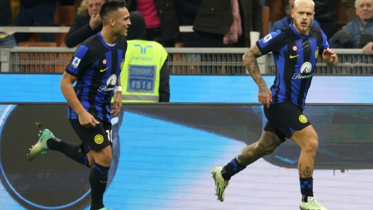 Inter Milans Federico Dimarco (R) jubilates with his teammate Lautaro Martinez after scoring goal of 1 to 0 during the Italian serie A soccer match between Fc Inter  and Frosinone Giuseppe Meazza stadium in Milan, 12 November 2023. ANSA / MATTEO BAZZI